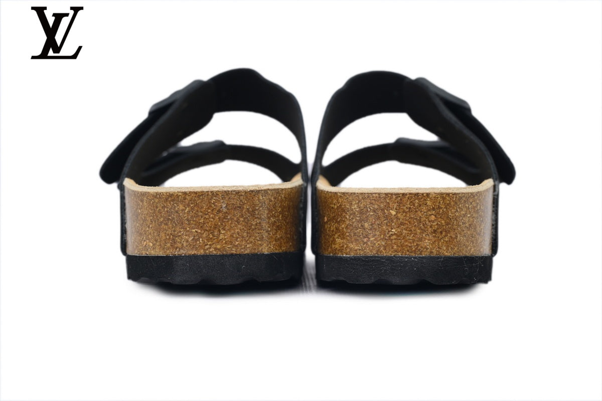 Birkenstock Slide Sandal in Black with Double Buckle and Cork Footbed
