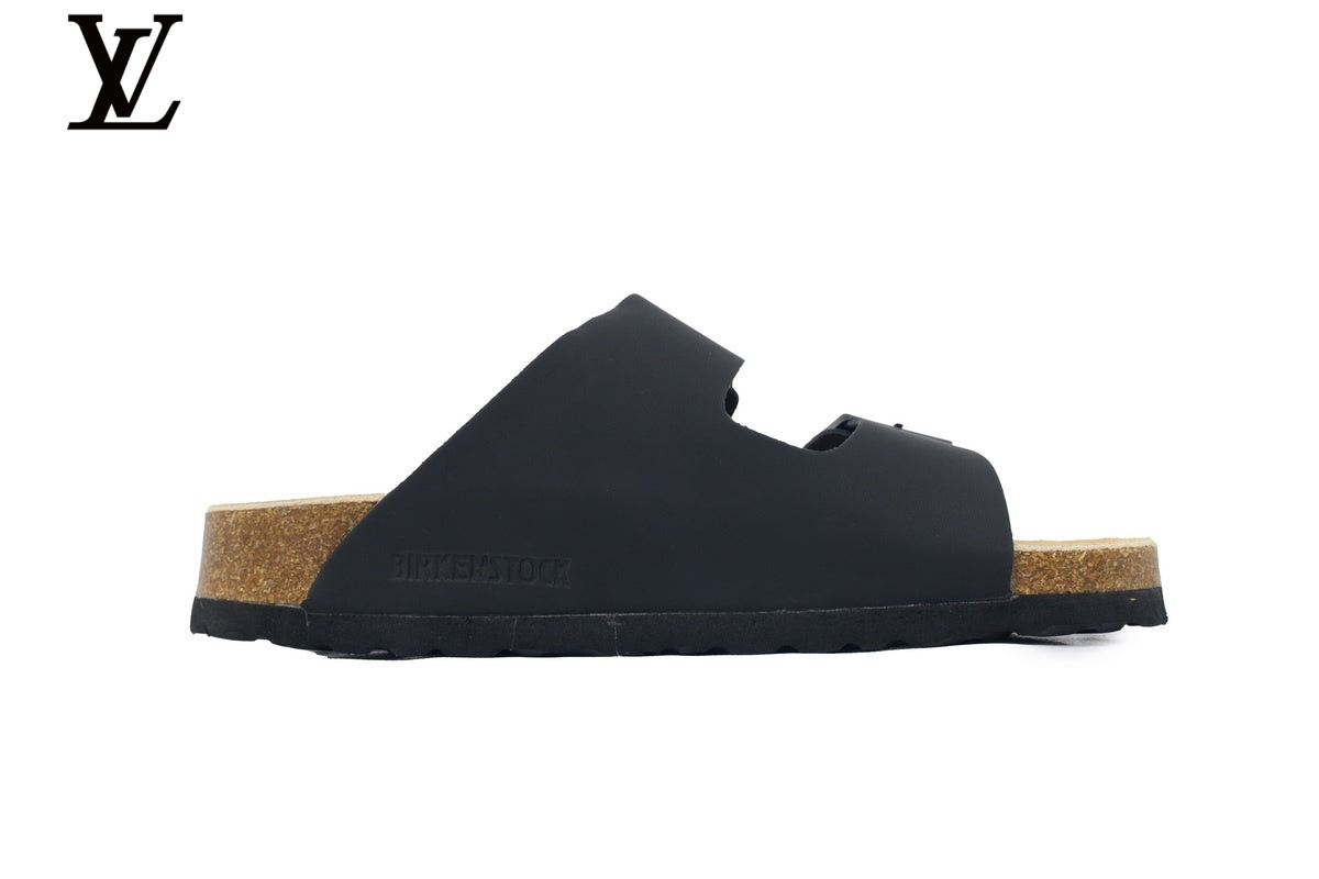 Birkenstock Slide Sandal in Black with Double Buckle and Cork Footbed